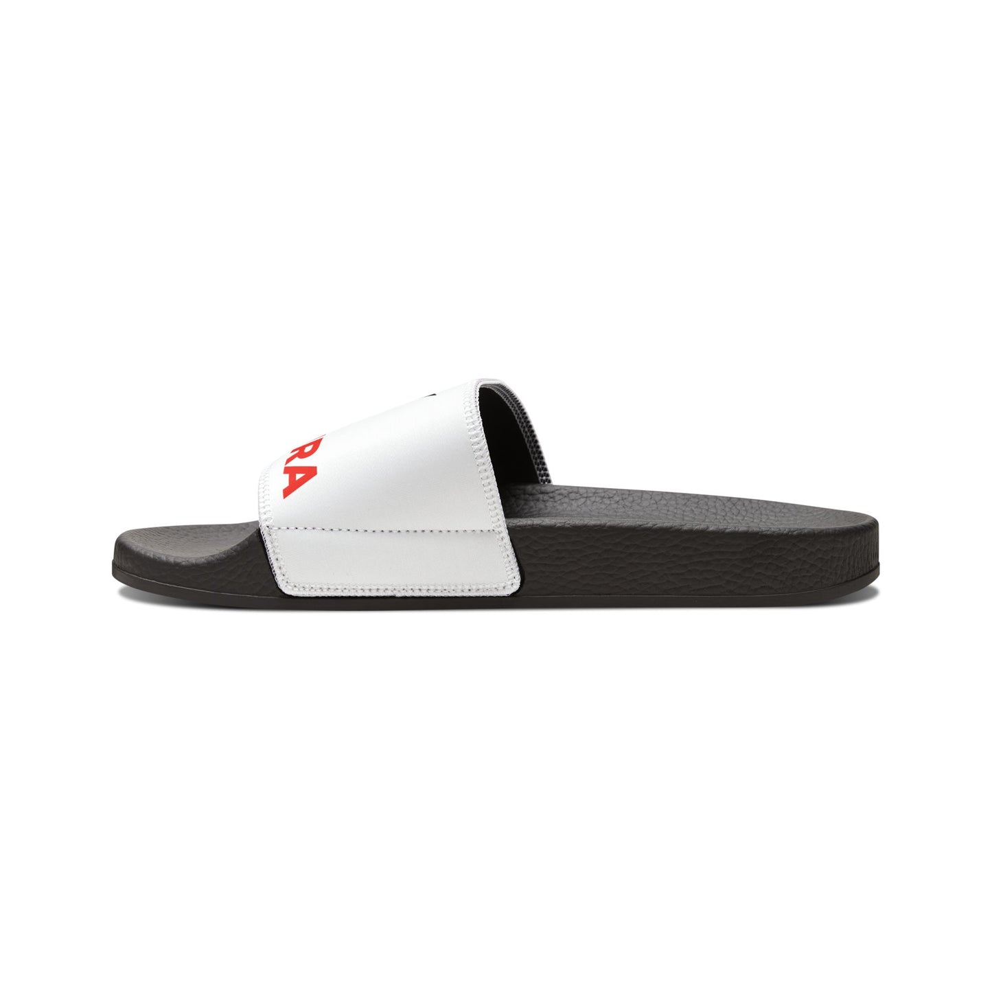 Side profile of white Zed Honra sandal being worn with black shorts and white socks.