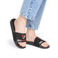 Zed Honra Women’s Sandals in black worn with jeans – front view