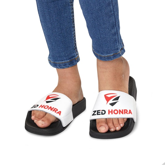 Zed Honra youth sandals in white with red logo – worn by child, front view