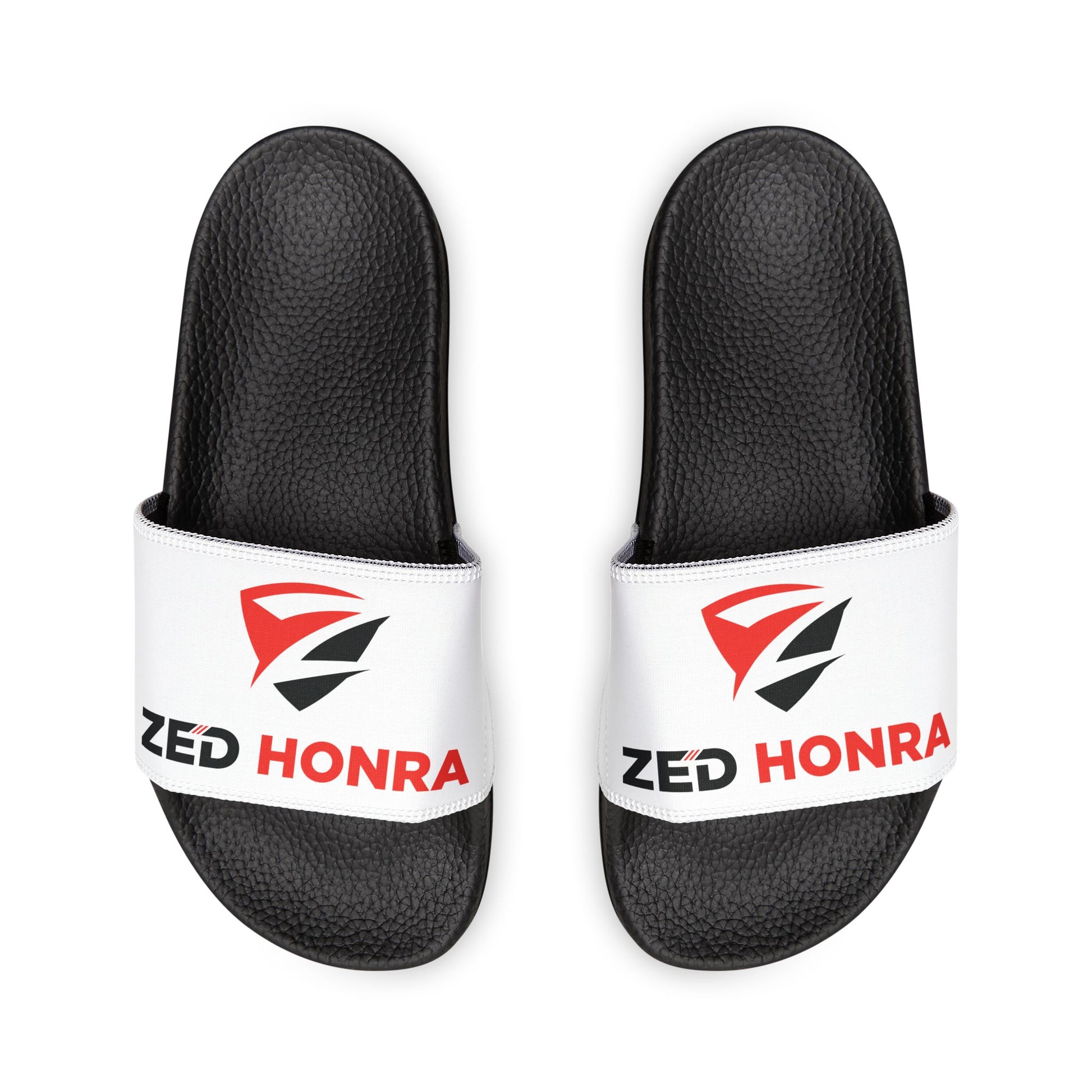 White Zed Honra sandals with red logo, shown from top view.