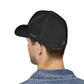 Black FlexFit Cap – left side profile view on model