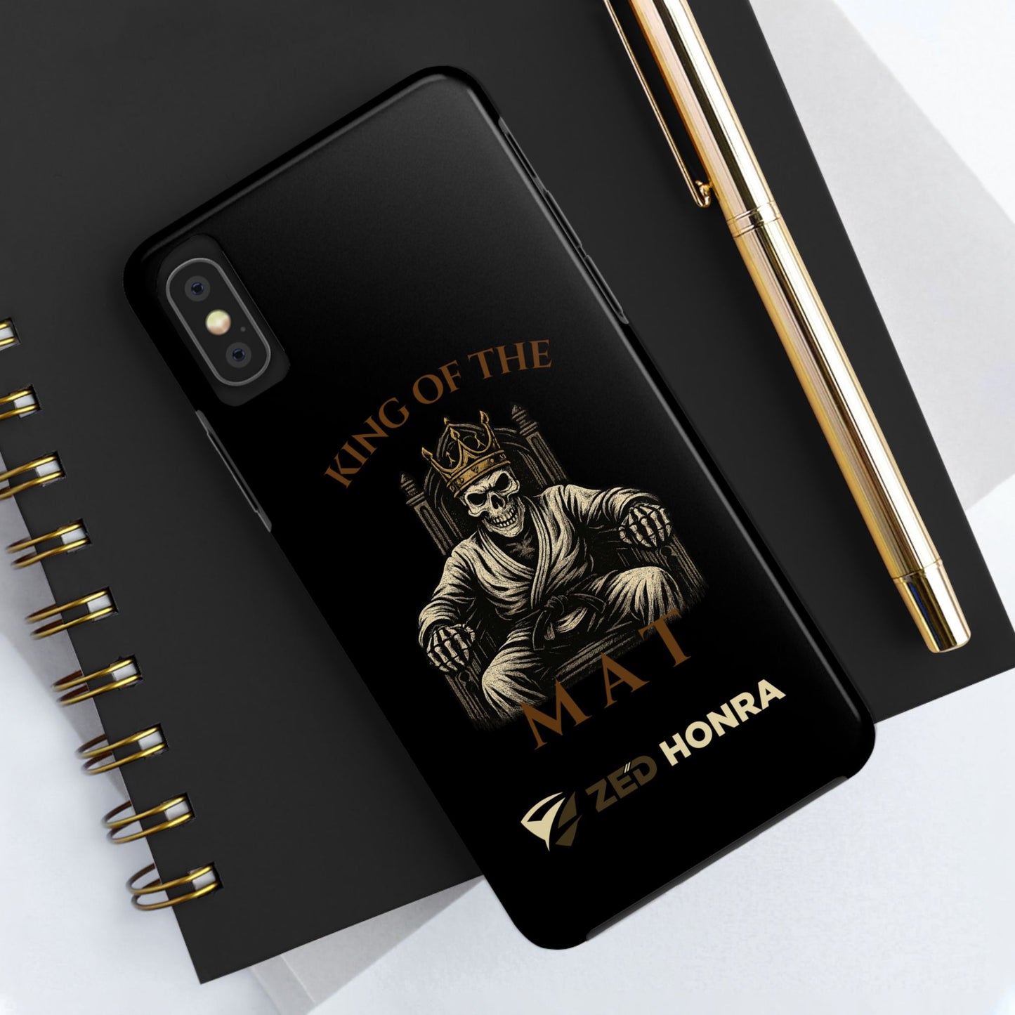 Phone case with a skull in a Zed Honra kimono and crown, text 'King of the Mat' and 'Zed Honra' logo.