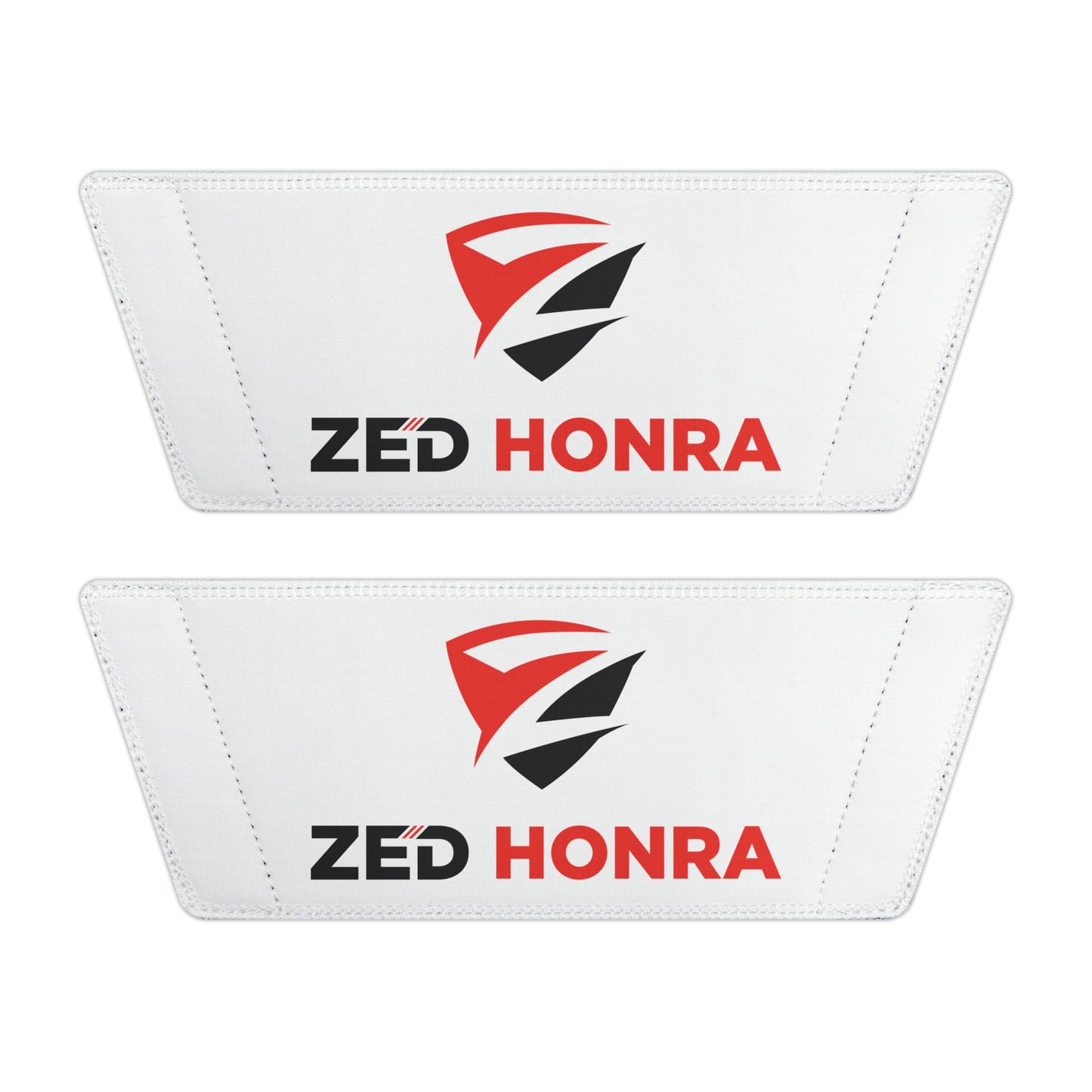 Two white patches with ZED HONRA logo on a white background