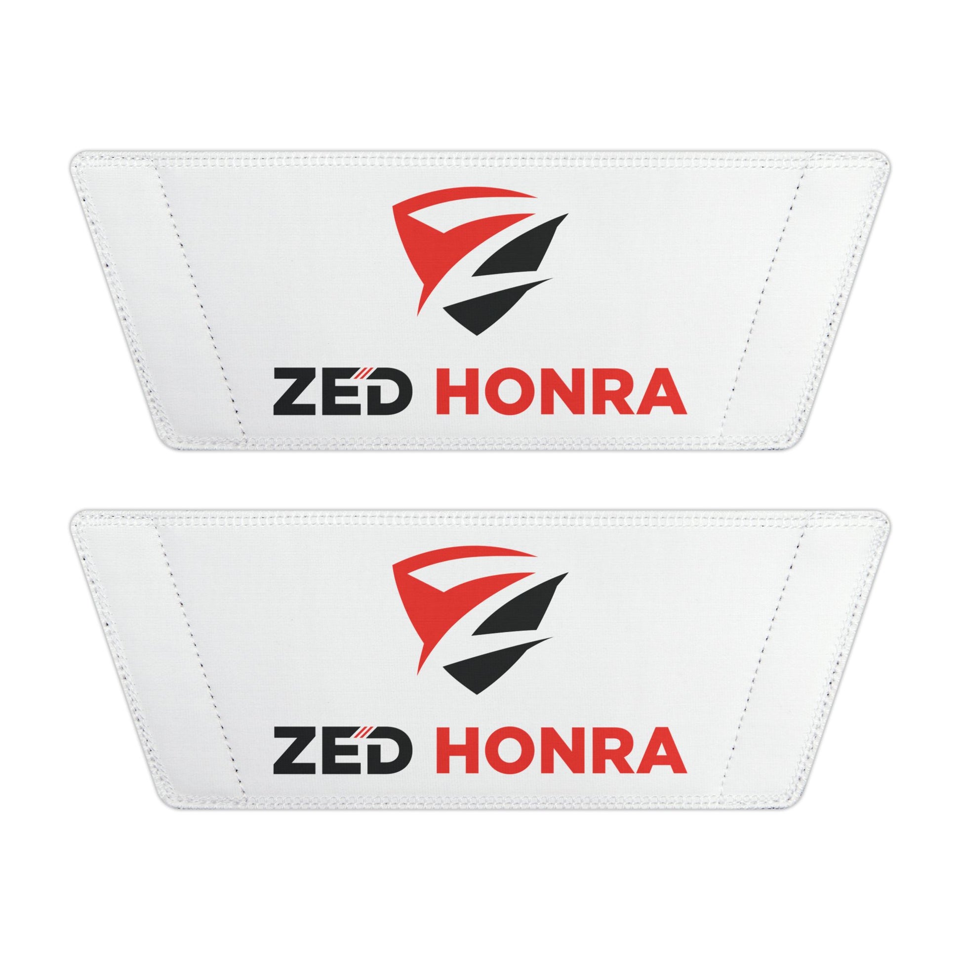 Two white patches with ZED HONRA logo on a white background