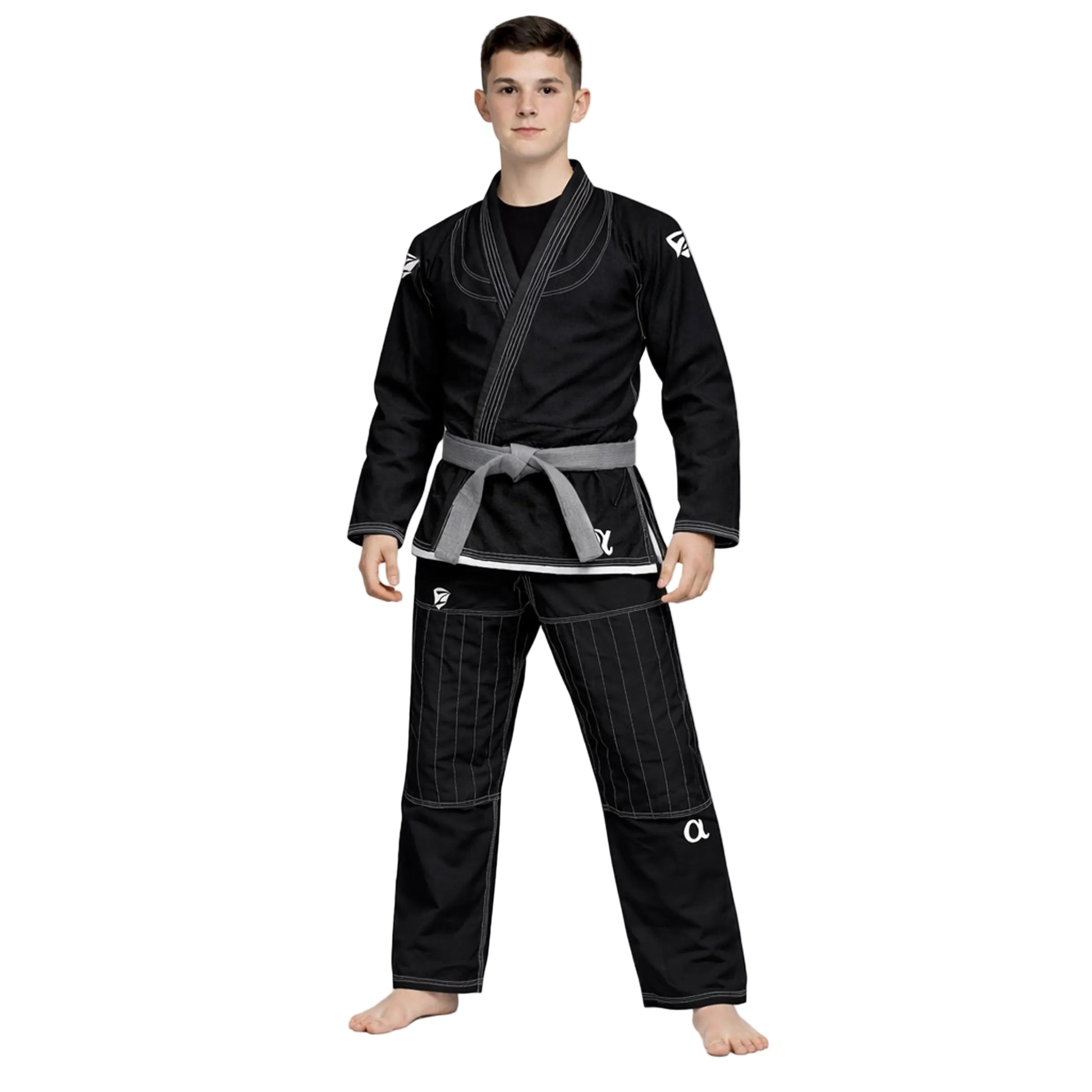Person wearing a black martial arts gi with a gray belt on a white background